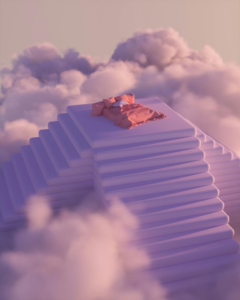 pexels-photo-11643390-11643390 A dreamlike scene with a bed atop stairs surrounded by pink clouds, evokes serenity.